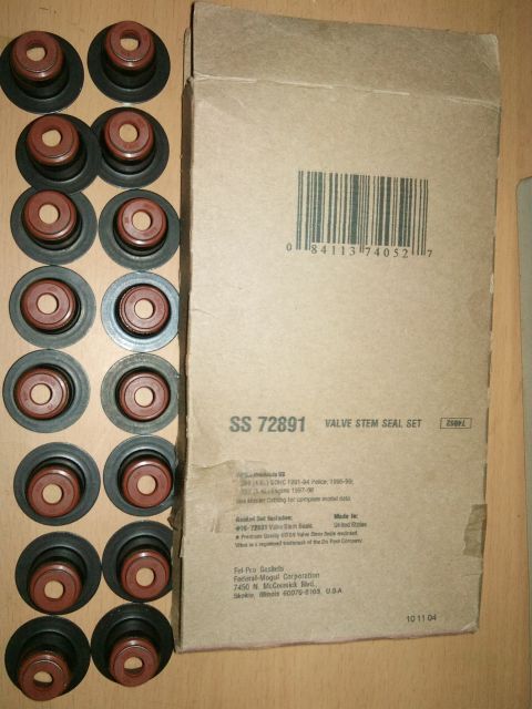 1998 Ford Crown Victoria - A box of Fel-Pro SS 72891 valve stem seals is shown next to the individual seals.
