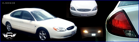2000 Ford Taurus - This 2000 Ford Taurus is shown in a 3/4 front view, highlighting its distinctive body style.