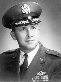 2003 Ford Crown Victoria - Portrait of a US Air Force officer in uniform, wearing a cap and medals.