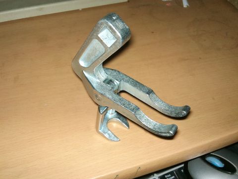 1998 Ford Crown Victoria - A Trick Flow valve spring compressor tool is shown on a wooden desk. The registry claims it is for a 1998 Ford Crown Victoria, but this is…