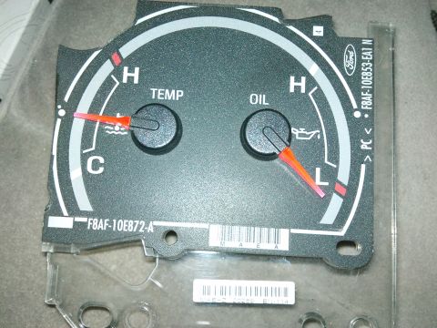 1998 Ford Crown Victoria - Ford instrument cluster gauge assembly, showing temperature and oil level indicators.