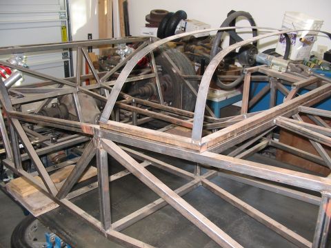 1993 Ford Taurus - Custom tube chassis construction in progress, with visible frame and roll cage components.