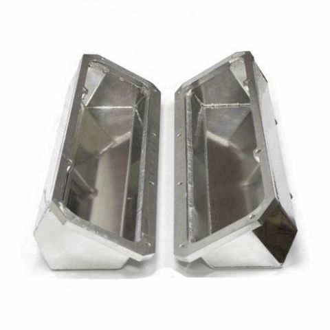 1972 Ford Ranchero - Two polished aluminum engine covers are shown from an angled perspective, highlighting their construction.