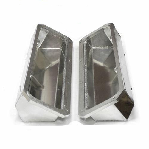Pair of polished aluminum engine covers, angled view, showing interior construction and bolt holes
