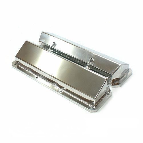Chrome valve covers with visible welds and bolt holes