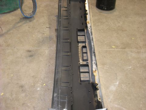 1993 Ford C-150 (Centurion Conversions) - Front bumper section with rectangular openings, likely for lights or grille inserts.