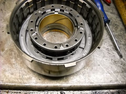 1993 Ford C-150 (Centurion Conversions) - A disassembled transmission drum shows internal components and a visible part number.