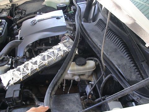 2002 Lincoln Town Car - Removal of Weather Stripping in progress