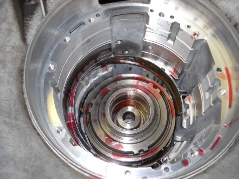 1993 Ford C-150 (Centurion Conversions) - Internal view of an automatic transmission torque converter, showing clutch plates and fluid.