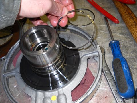 1993 Ford C-150 (Centurion Conversions) - Broken ring being removed from a transmission component during a rebuild.