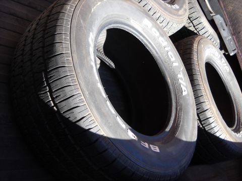 1993 Ford C-150 (Centurion Conversions) - A close-up view of several BFGoodrich Radial T/A tires, showing their tread and sidewall details.
