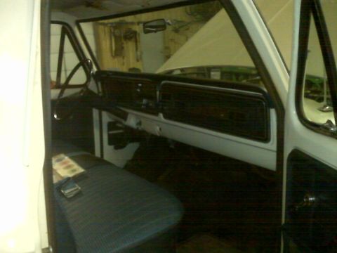 1973 Ford F-100 - Interior view of a 1973 Ford F-100 truck, showing the dashboard and driver's seat.