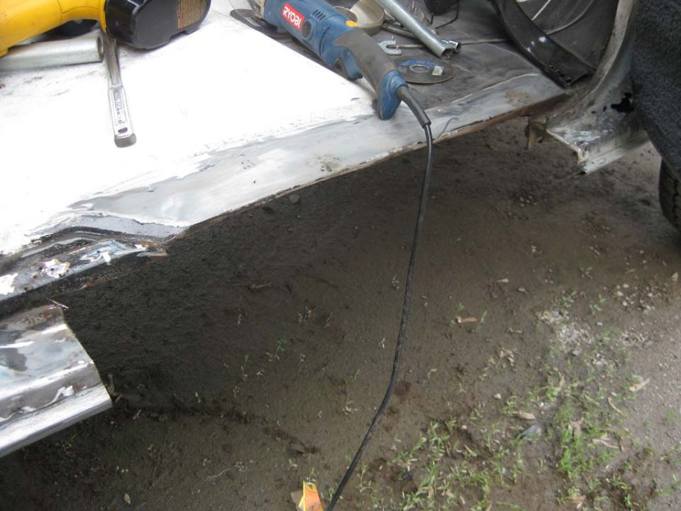 The rest of the rocker panel cut out.