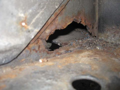 1983 Ford Bronco - Once I cut away the metal it revealed this on the back side. I couldn't get at it to replace the metal, so I did what I had done with the o…