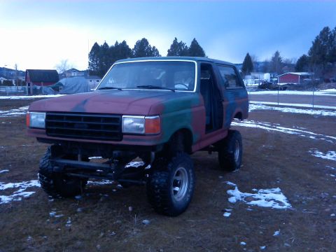 1988 Ford Bronco - This modified Ford Bronco sits high on its suspension, ready for off-road adventures.