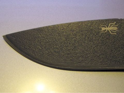 1984 Ford Bronco - Knife blade with an ant logo, likely a Spyderco knife.