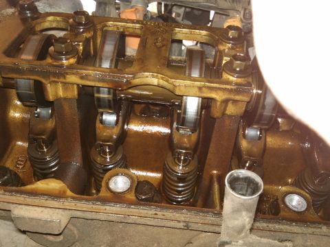 1998 Ford Crown Victoria - Engine valve train components, likely from a Ford Crown Victoria, showing rocker arms and springs.