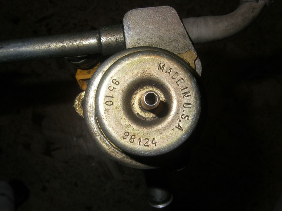 Fuel pressure regulator with 'MADE IN U.S.A.' and numbers 8510, 98124 stamped on it