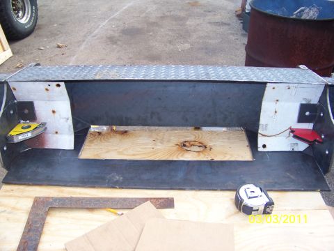 1989 Ford Bronco - Custom bumper fabrication in progress, showing metalwork and light installation.