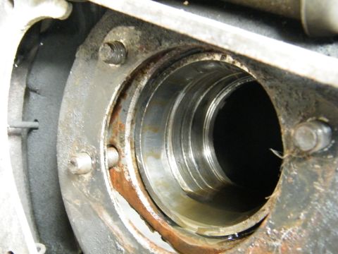 1982 Ford Bronco - Close-up view of a vehicle's differential housing interior, showing bearing races and mounting bolts.