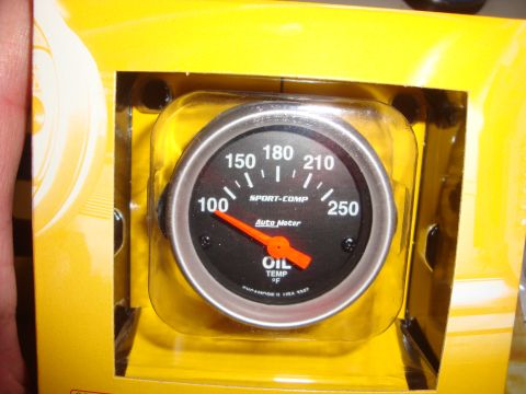 1989 Ford Bronco - New Auto Meter oil temperature gauge, part of a registry album entry.