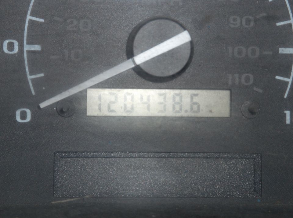 Vehicle odometer showing 120438.6 miles