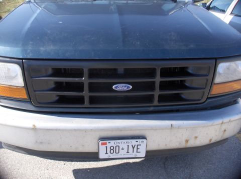 1994 Ford F-150 - Front view of a 1994 Ford F-150, showing the grille, headlights, and bumper with an Ontario license plate.