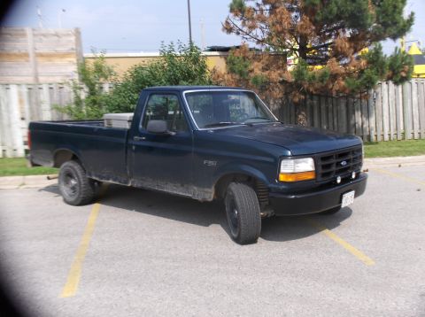 1994 Ford F-150 - This 1994 Ford F-150 pickup truck is seen from a 3/4 front angle.