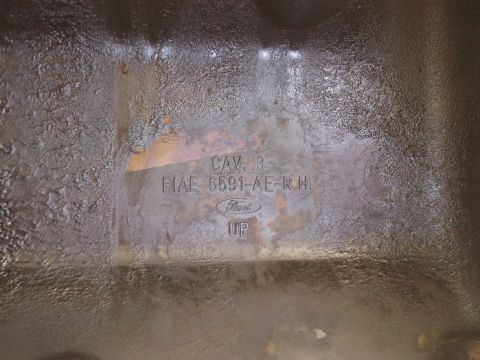 1998 Ford Crown Victoria - A Ford part with embossed text and the Ford logo is shown.