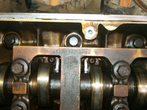 1998 Ford Crown Victoria - Engine valve train components, including camshafts and part number FIAE-6B280-DC.