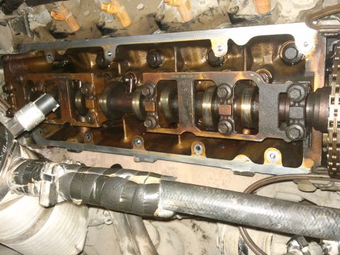 1998 Ford Crown Victoria - Close-up view of an engine's internal components, showing the camshaft and related parts.