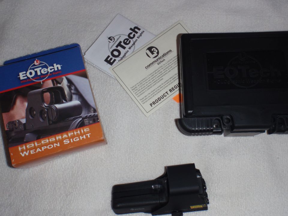 EOTech holographic weapon sight box, paperwork, and the sight itself