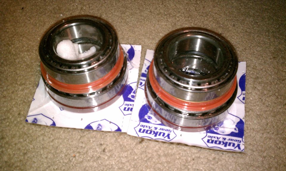 Two Yukon Gear & Axle wheel bearings on packaging