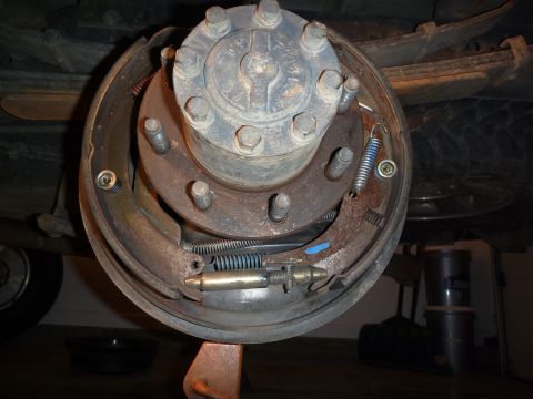 1997 Dodge 2500 - Close-up of a vehicle's rear drum brake assembly, showing the hub and brake shoes.