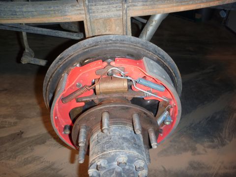 1997 Dodge 2500 - Close-up view of a rear drum brake assembly, showing the brake shoes and springs.