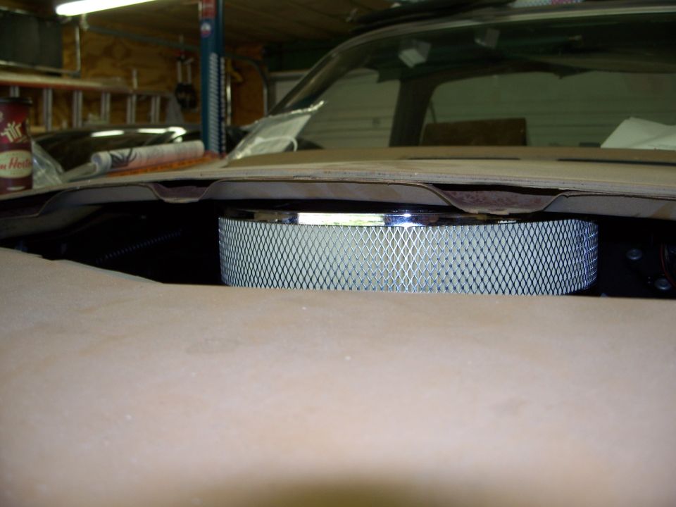 Chrome air cleaner under open hood