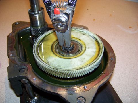 1994 Ford F-150 - A close-up view of internal transmission components being serviced with specialized tools.