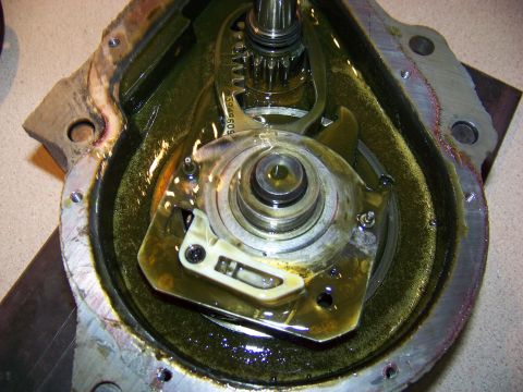 1994 Ford F-150 - Close-up of a transmission part, showing internal gears and fluid.