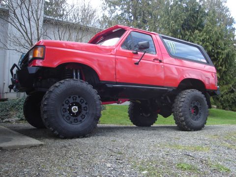 1989 Ford Bronco - Modified 1989 Ford Bronco with off-road tires and suspension lift.