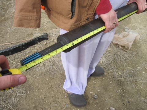1978 Ford Bronco - Measuring a driveshaft. The part has splines on one end and a large diameter on the other.