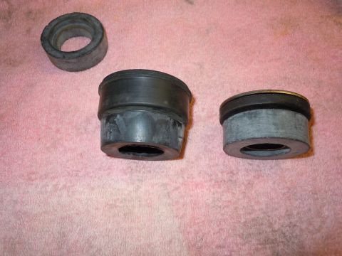 1970 Chevrolet Camaro - Three rubber bushings are laid out on a pink towel.
