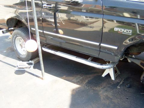1995 Ford Bronco - A picture of the nerf bars that would have to go to make way for the new extended radius arm brackets.