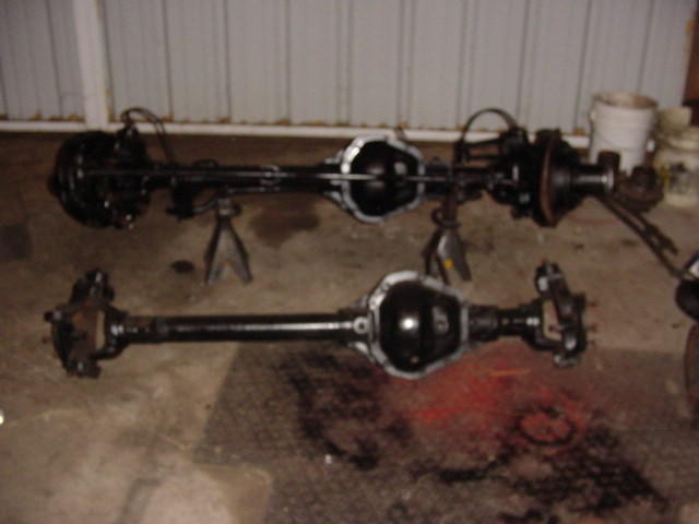 87 front, rear is 78.  notice the difference in axle tube length on driverside.