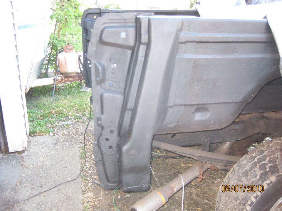 Just a note:  Make sure you have measured the distance from some point on the side of the truck to that back edge.  If it isn't the same with the new piece in, the new 1/4 wont fit properly and the tail gate won't line up with the cap properly.