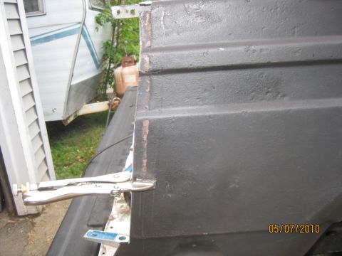 1983 Ford Bronco - Using a flanging tool to prepare for the overlap of the new material.