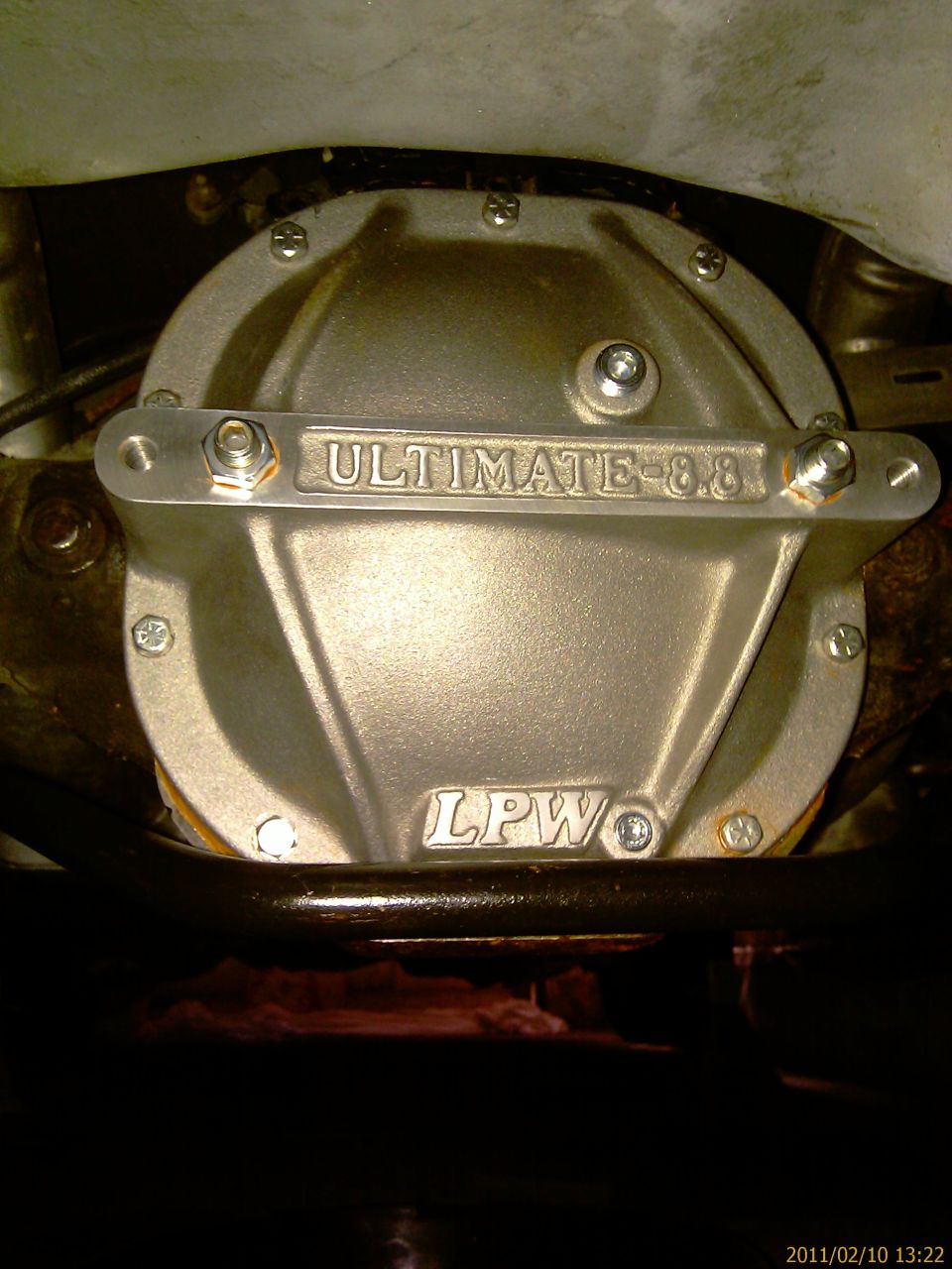 Aftermarket differential cover labeled "ULTIMATE 8.8" and "LPW"