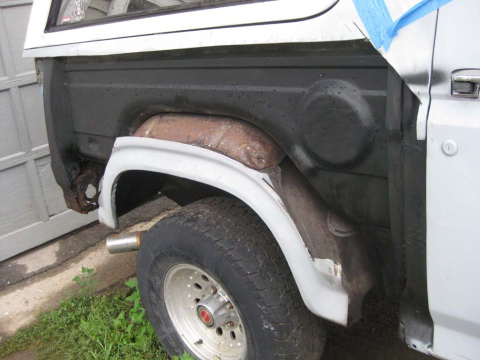 I took the quarter panel apart in pieces, leaving the top edge so I could procrastinate on removing the top.
