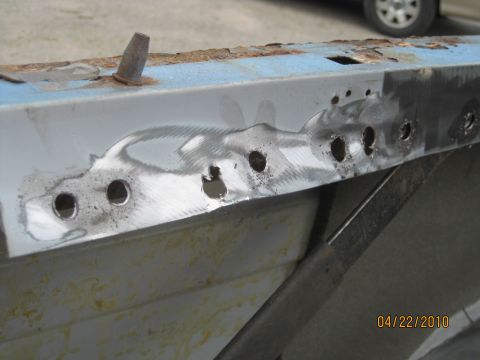 1983 Ford Bronco - By lightly grinding along the edge it is easier to find all the spot welds. You can see the weld buster being tapped along to get any remai…