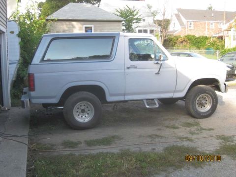 1983 Ford Bronco - While I had the cap off, I sanded it and painted it Ford Shadow Grey. Also note the new stock twin pipe exhaust. As far as I'm concerned th…
