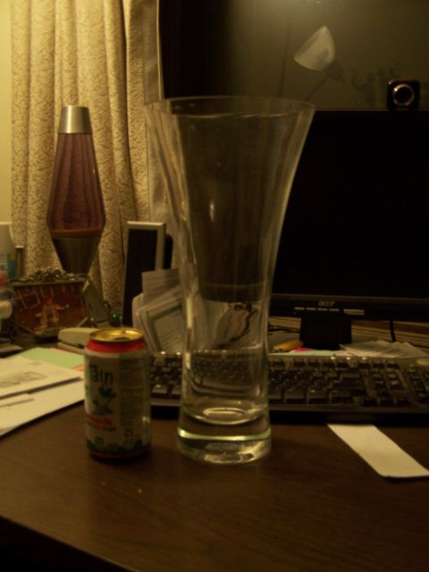 1900 Acura CL - A desk scene includes a can of beer, a tall glass, a computer monitor, and a lava lamp.